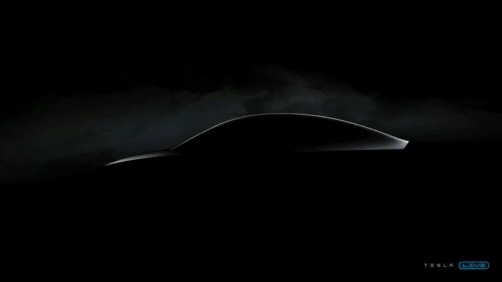 Tesla-compact-car-teaser-1024×576-1